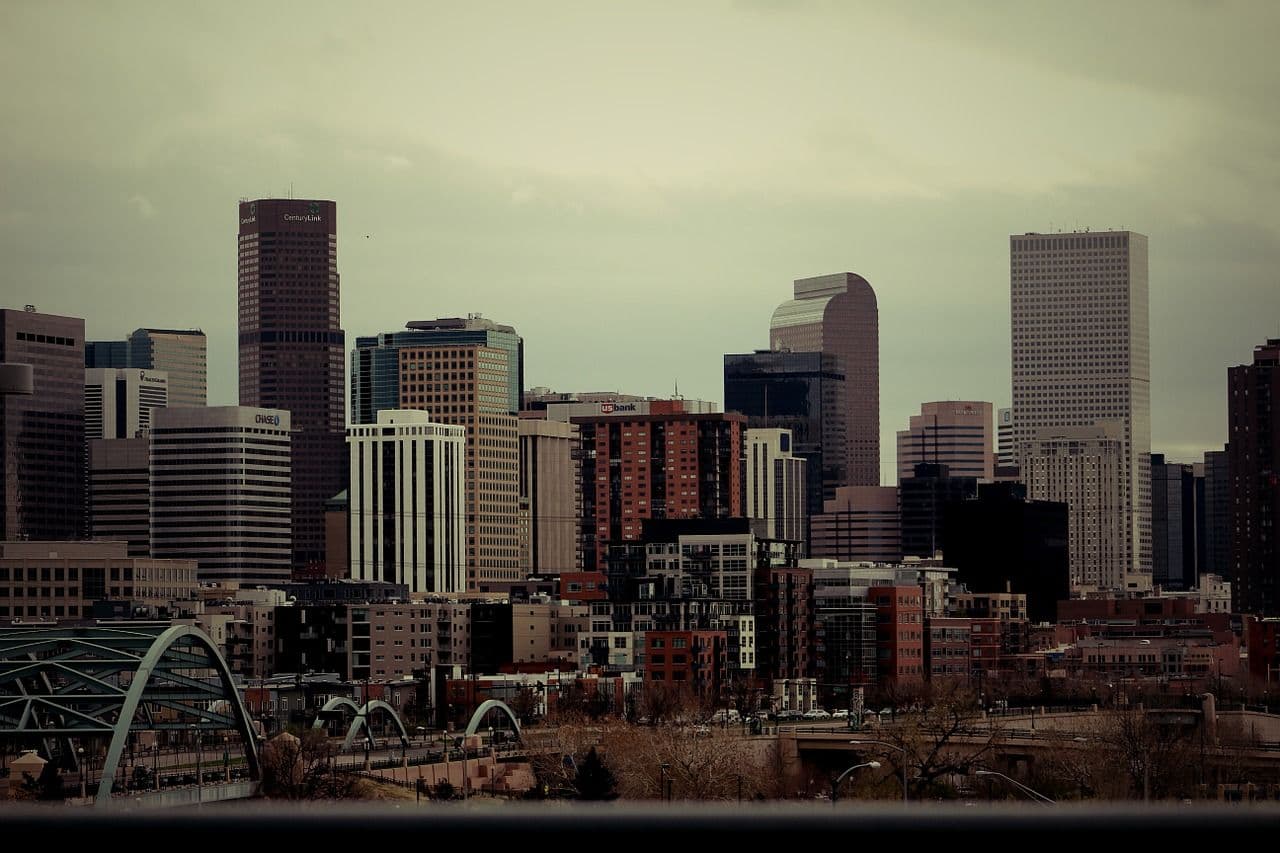 Denver Colorado skyline with Rocky Mountains